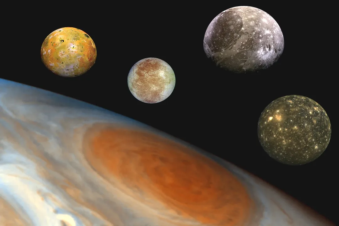 How do astronomers think the four Galilean moons of Jupiter formed?