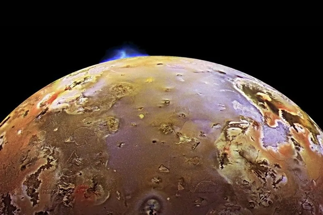 How does the geological activity on Io compare to the activity on other moons?