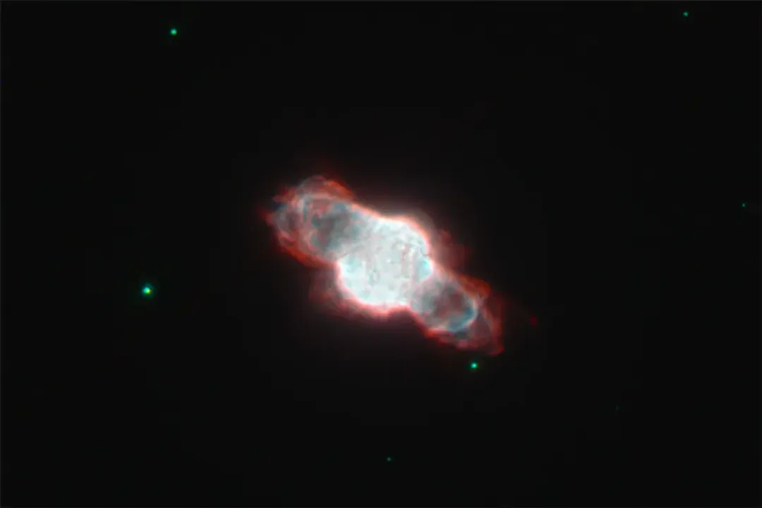 What is a planetary nebula and why do we see it glowing?