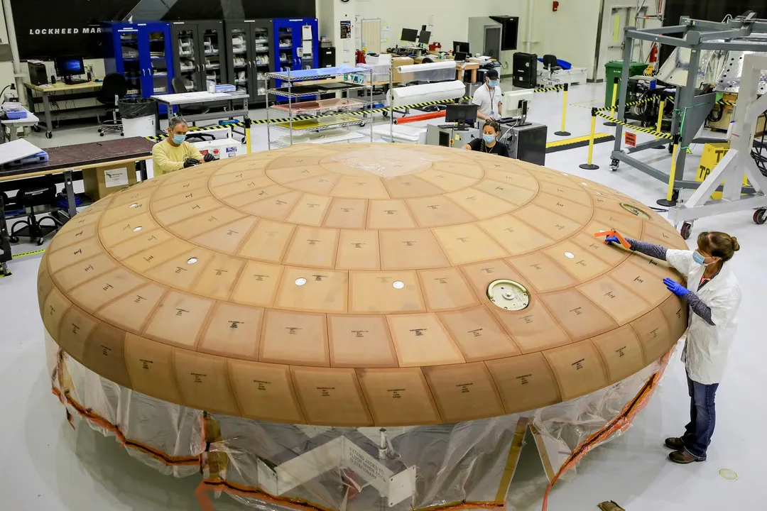 What material is the spacecraft heat shield made of?