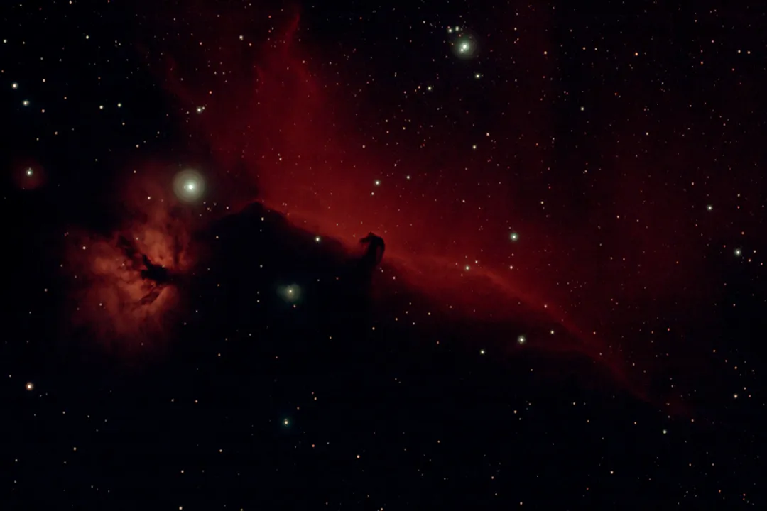 What process makes an emission nebula glow?