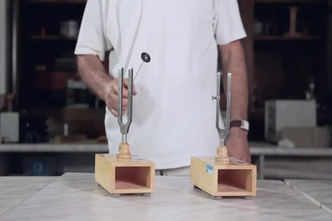 What causes acoustic resonance?