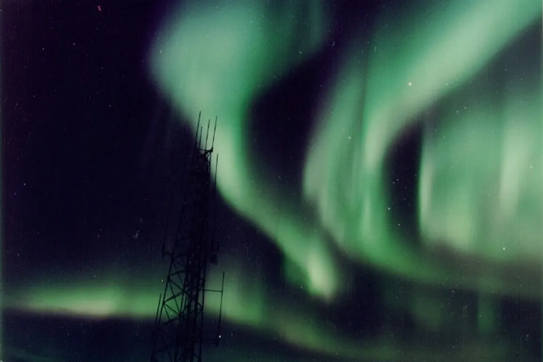 What is the main cause of an aurora?