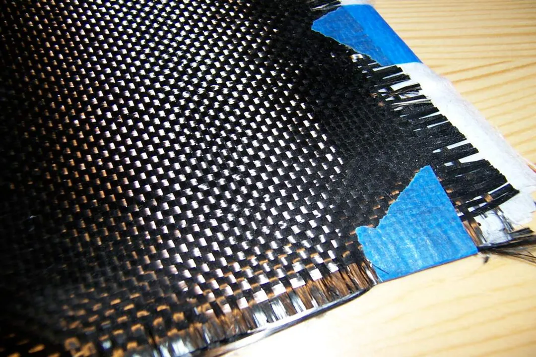 Which company invented carbon fiber?