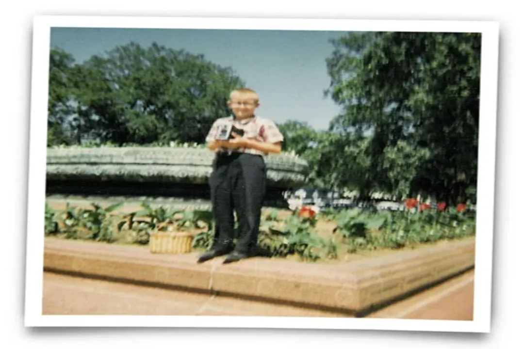 Who invented a small box camera that made it cheaper to take pictures?, Eastman's Drive