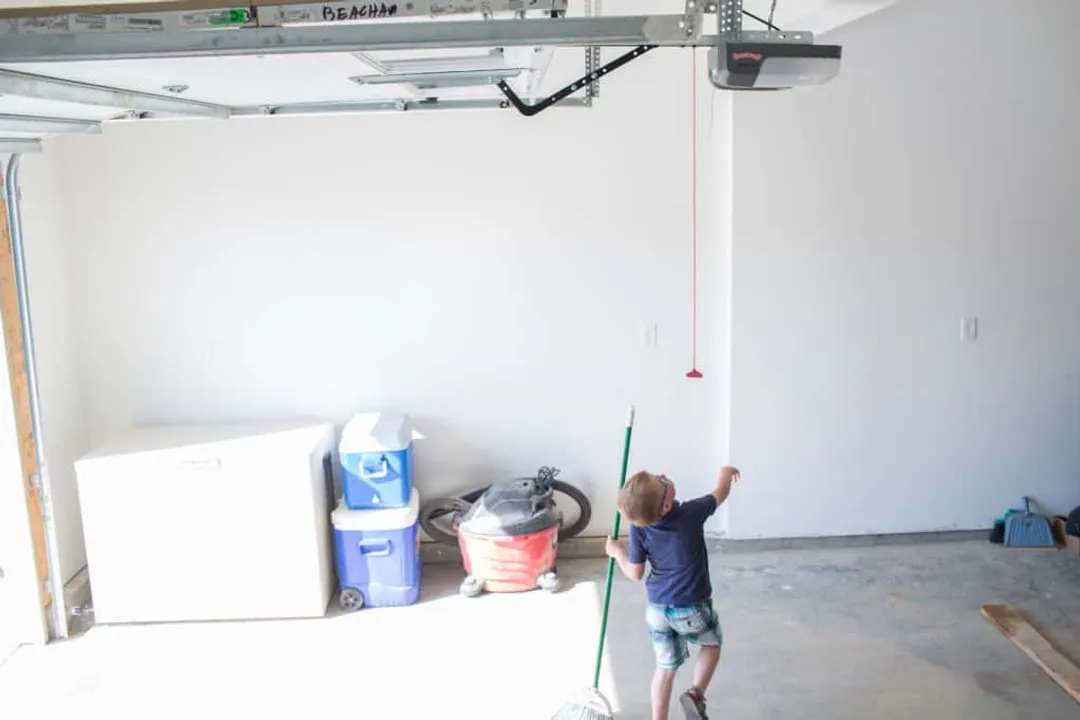 Who invented the first garage door?