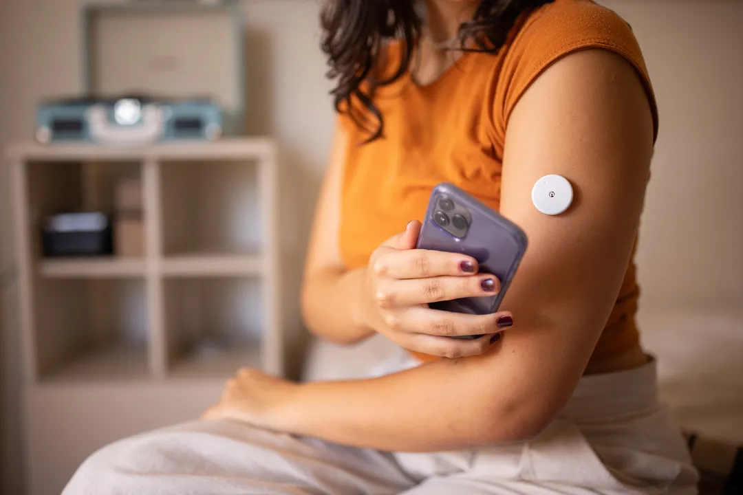 Who invented wearable glucose monitors?