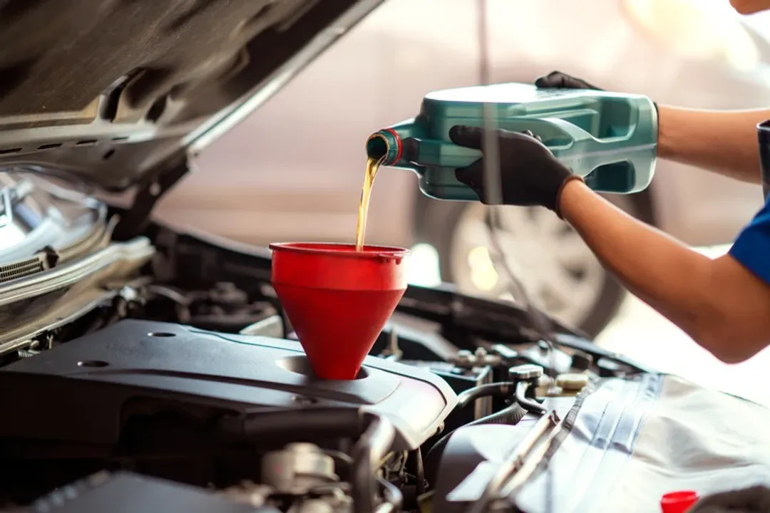 What specific milestone did Al Amatuzio achieve regarding synthetic motor oil in 1970?