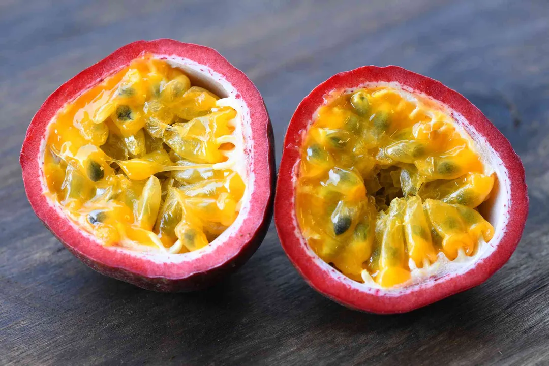 How does consuming passion fruit, especially the seeds, contribute to supporting heart health?