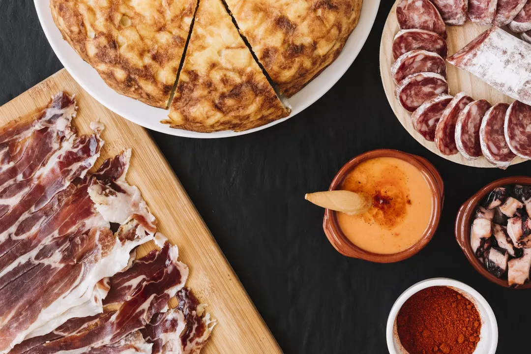 What are three traditional Spanish dishes?