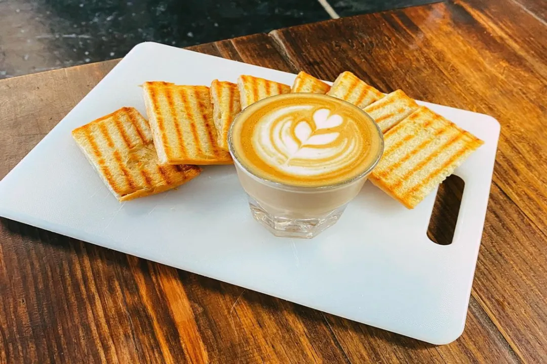 How long do The Lab's hand-rolled bagels undergo fermentation?