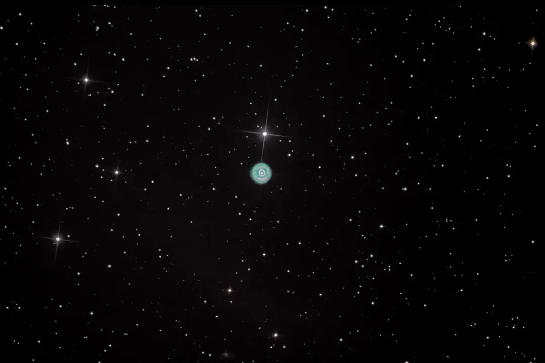 How far away is the Eskimo Nebula?
