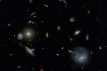 Why is it helpful to look at very distant galaxies to study galaxy formation and evolution over cosmic time?