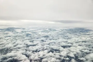 What causes clouds to sink?