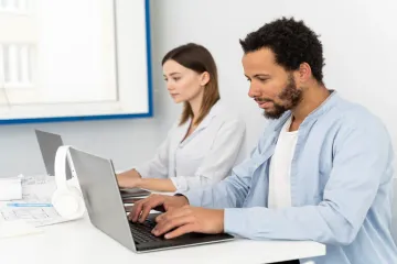 Who invented AI symptom checkers?